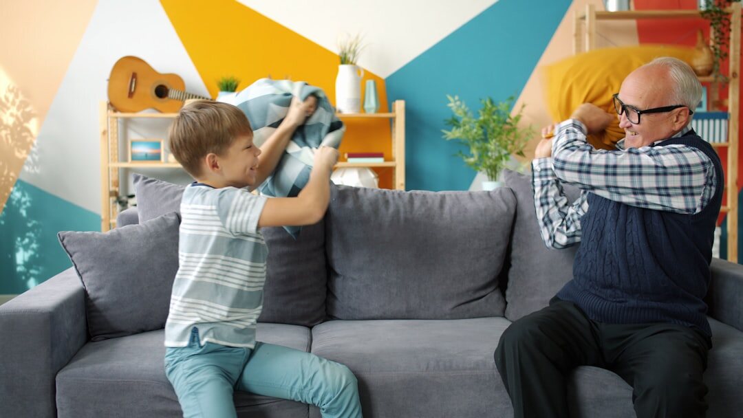 Turkish grandparents spending time with adult children in a bright living room
